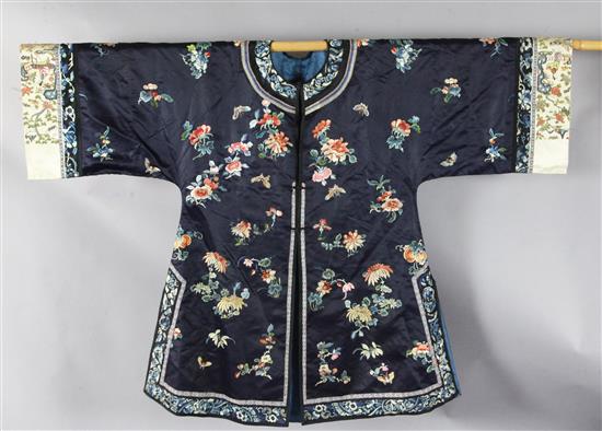 A Chinese embroidered midnight blue silk robe, 20th century, length 99cm